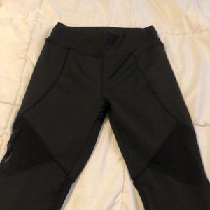 Black mesh athletic leggings. Large but fits like a medium.